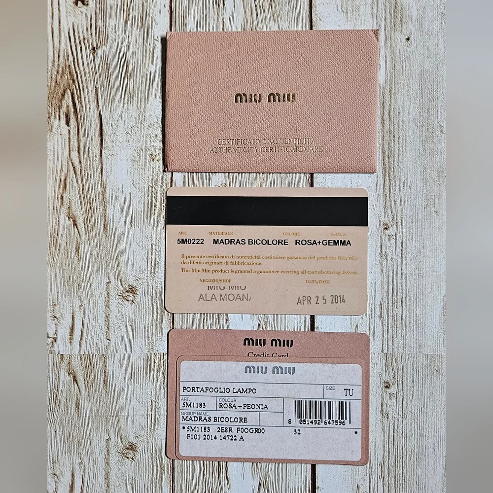 Miu Miu Pink Wallet with Elegant Zip Closure